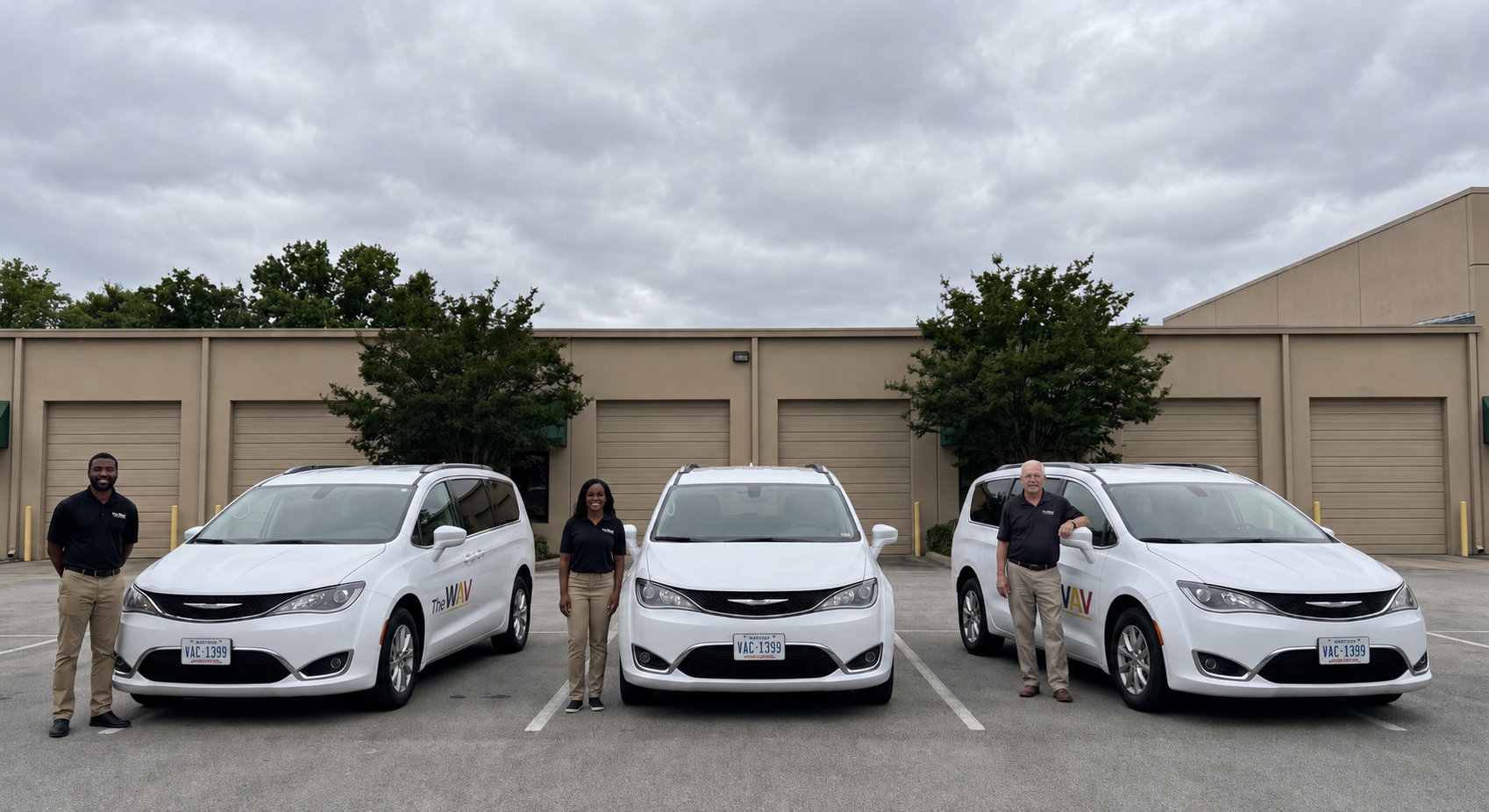 The Wav driver team and branded vehicles